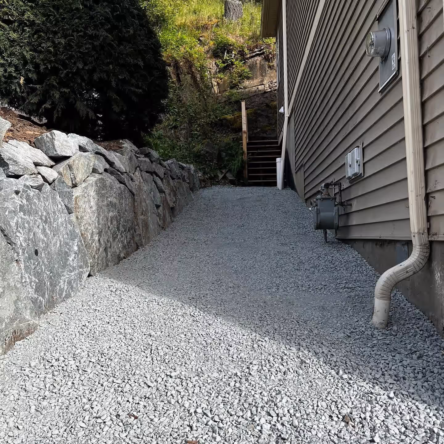 Installing perimeter drain tile around a Nanaimo foundation