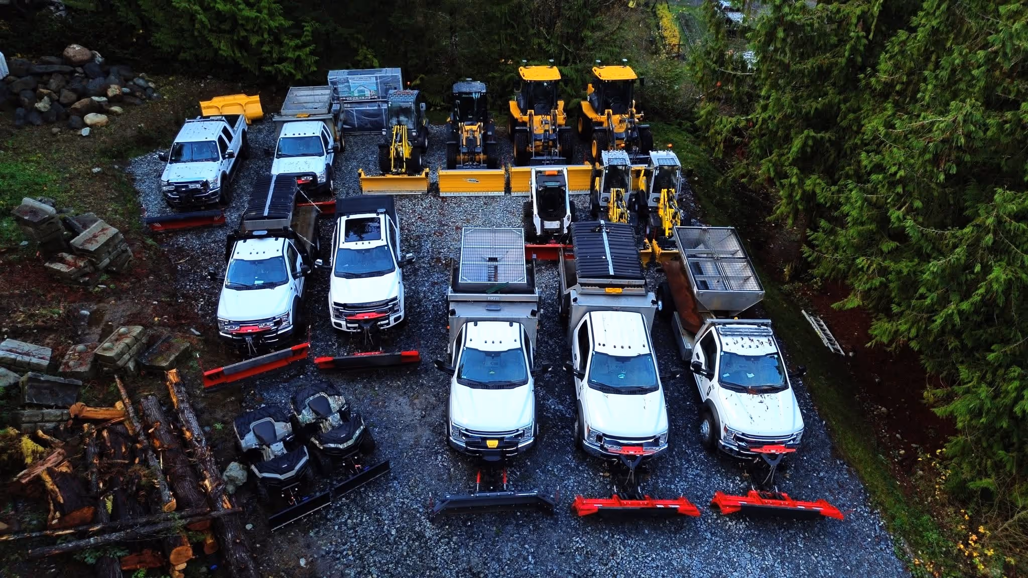 Aerial view of the Maxx Contracting fleet and snow plows