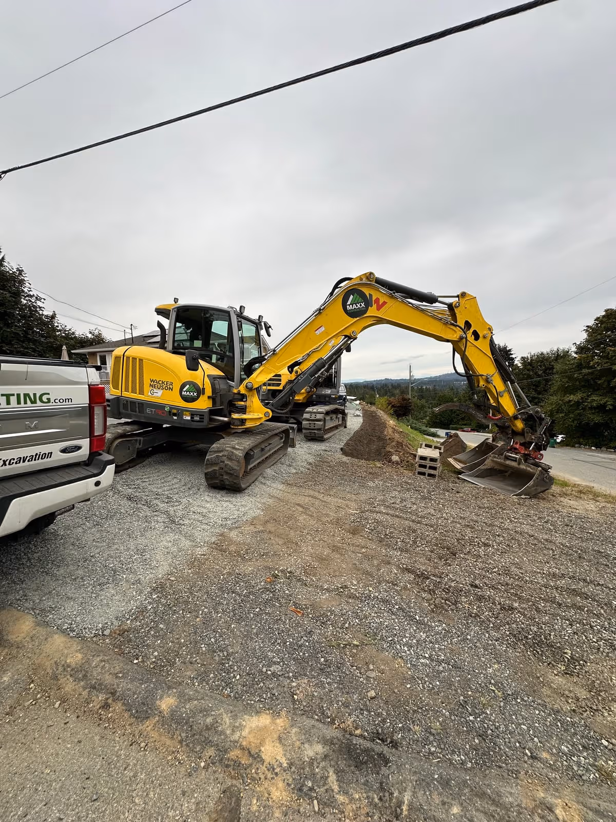 Excavator on a roadway construction site near Nanaimo