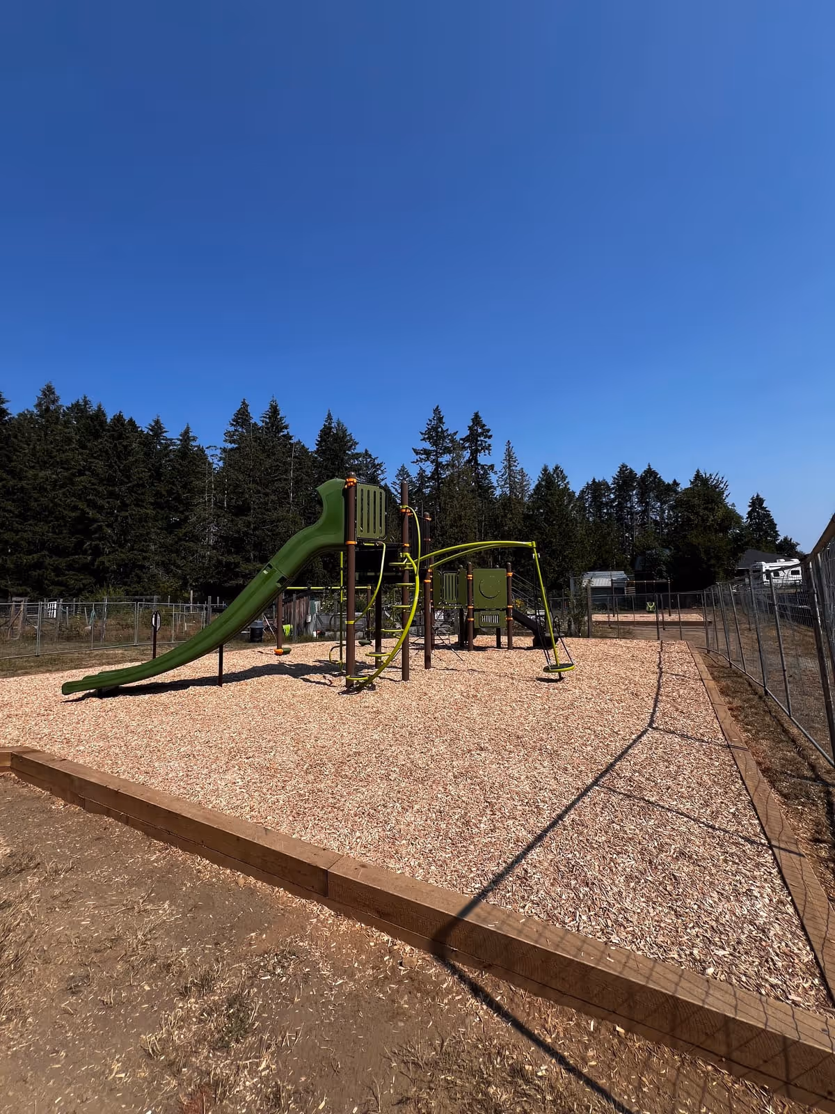 Completed playground with wood chip surfacing