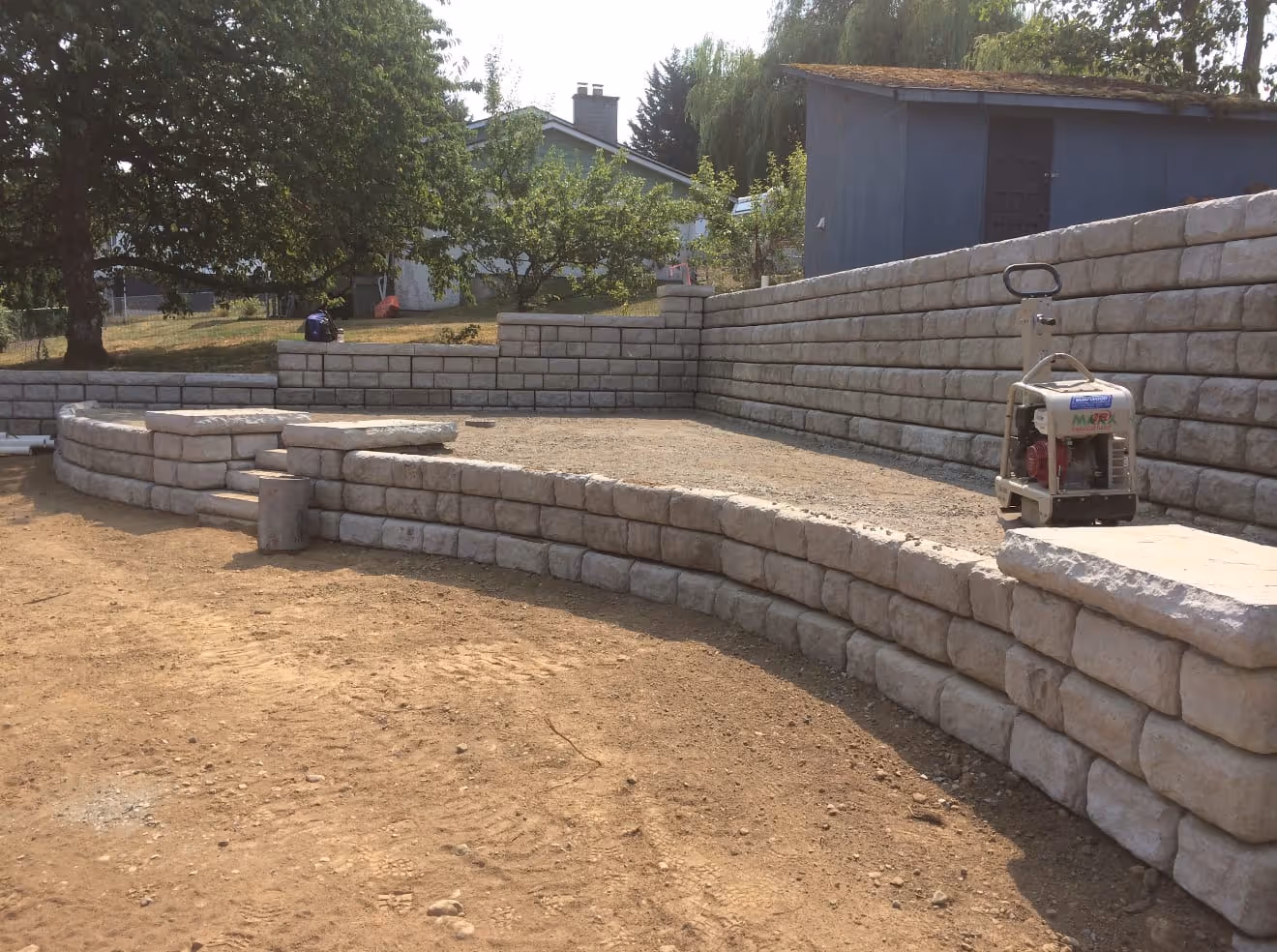 Light block L-shaped retaining wall under construction