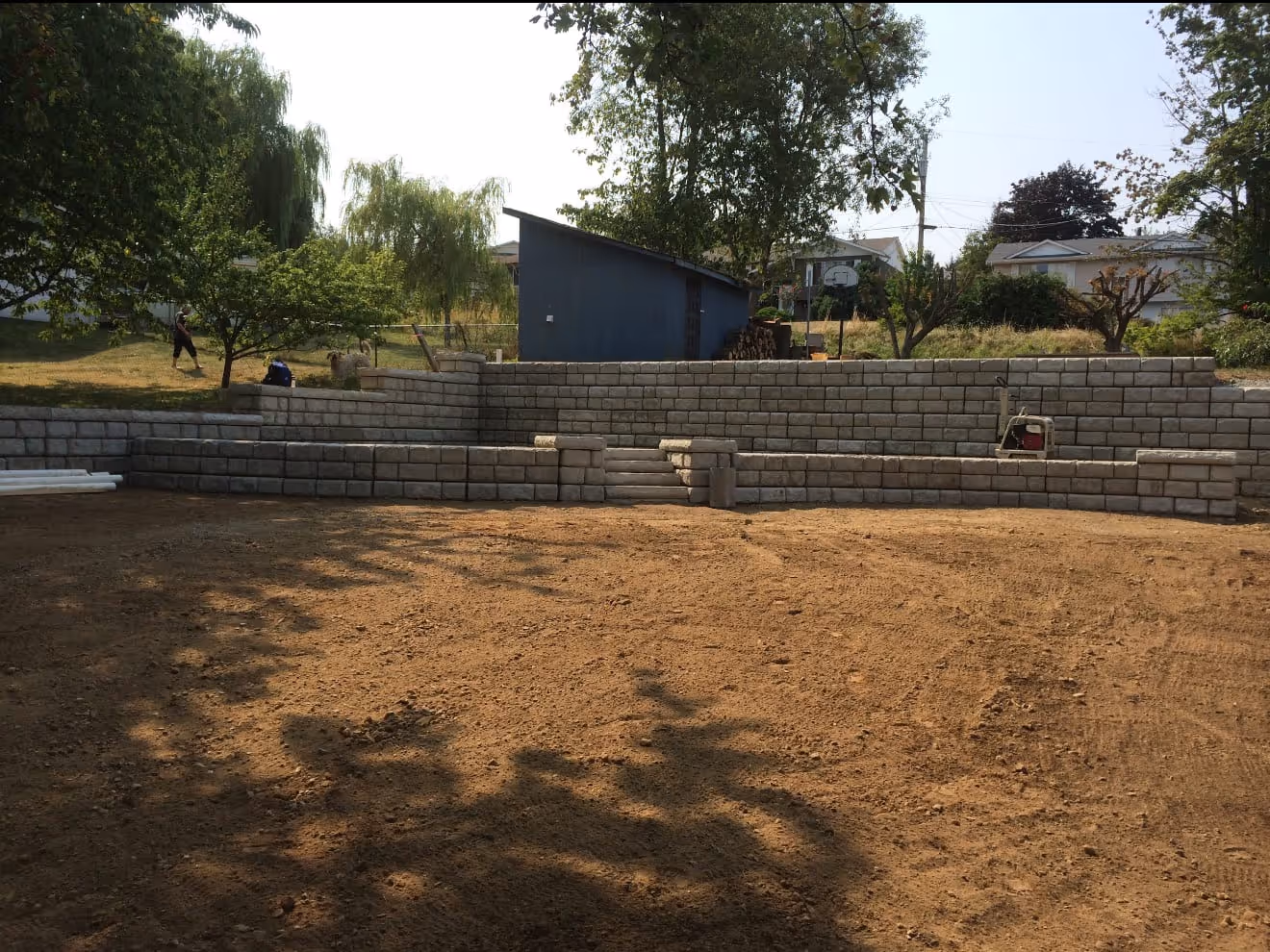 Light block retaining wall under construction, overhead view